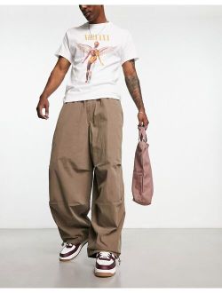oversized parachute pants in washed brown