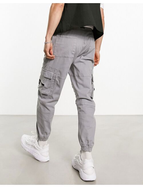 Bershka pocket cargo sweatpants in gray exclusive to ASOS