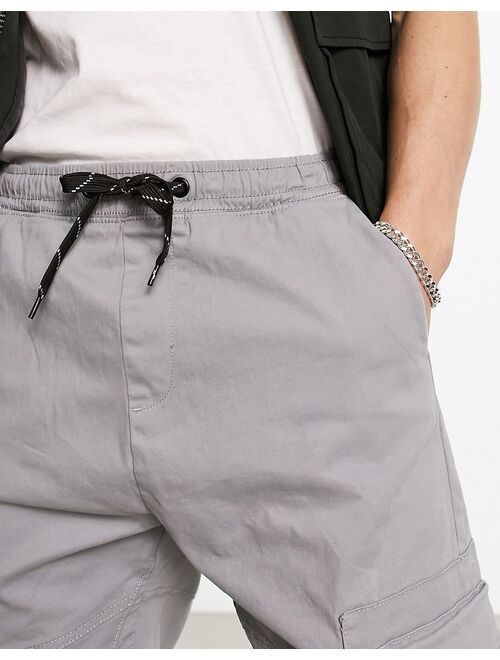 Bershka pocket cargo sweatpants in gray exclusive to ASOS