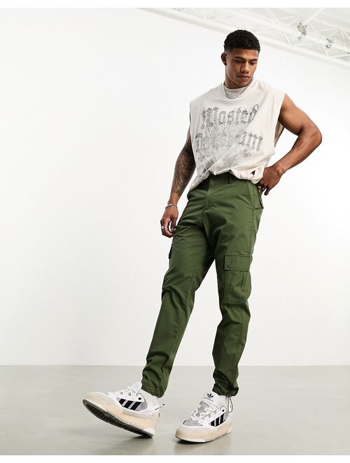 ASOS DESIGN tapered lightweight cargo pants in olive green