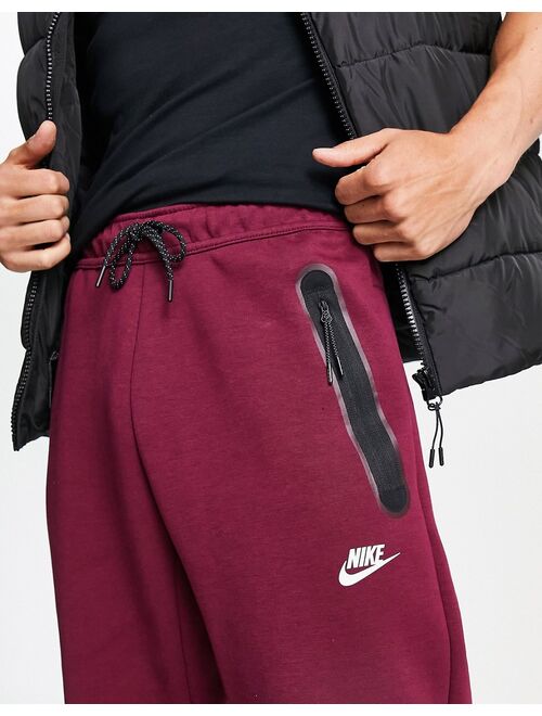 Nike Tech Fleece joggers in dark red