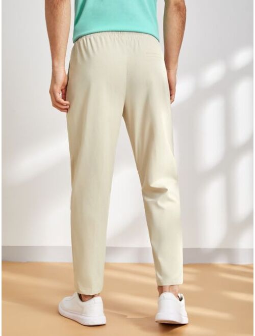 Manfinity Basics Men Solid Drawstring Waist Pants