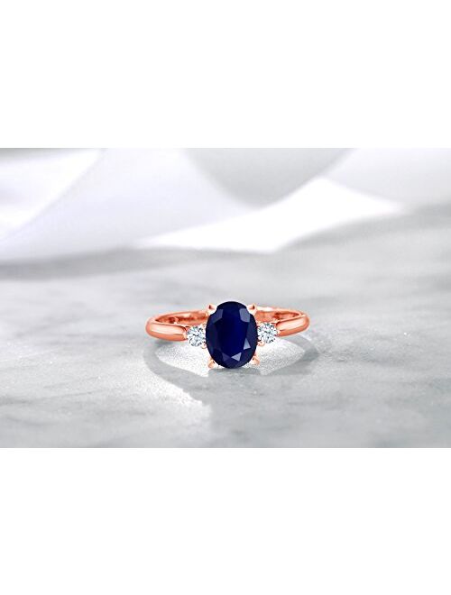 Gem Stone King 10K Rose Gold Blue Sapphire and White Created Sapphire 3 Stone Engagement Ring For Women (1.89 Cttw, Oval Gemstone Birthstone, Available In Size 5, 6, 7, 8