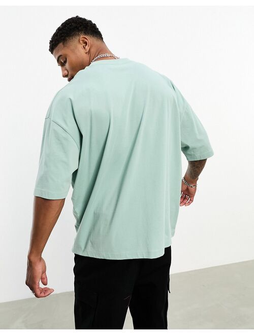 ASOS DESIGN oversized t-shirt in pale blue with line front print
