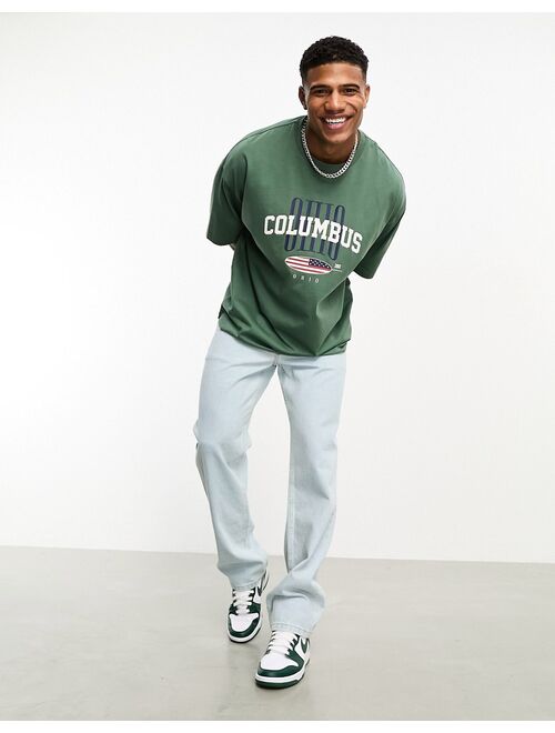 ASOS DESIGN oversized t-shirt in deep green with city chest print