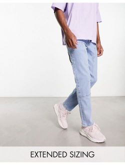 slim jeans with carpenter detail in light wash blue