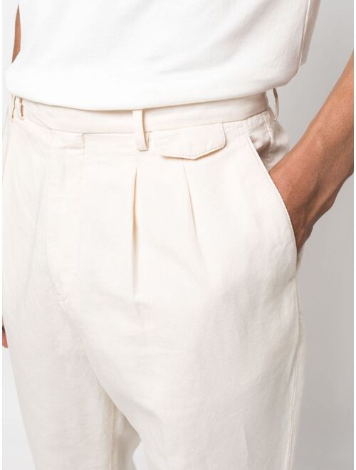 Brunello Cucinelli pleated cotton tapered trousers