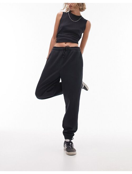 Topshop Petite oversized cuff sweatpants in washed black