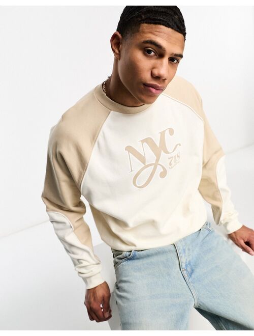 ASOS DESIGN oversized sweatshirt with NYC print in beige