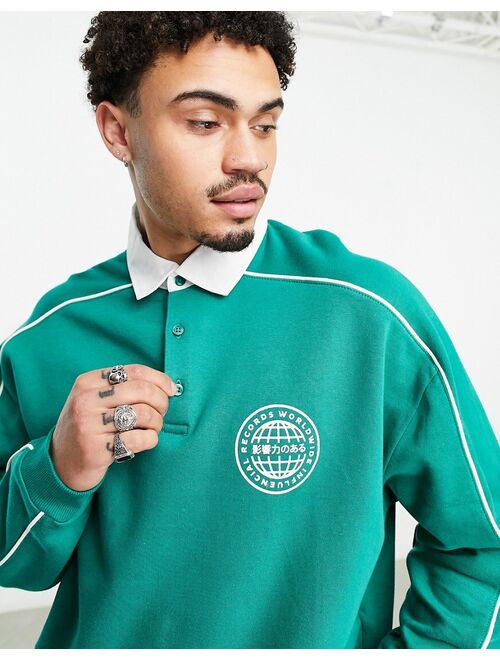 ASOS DESIGN oversized rugby sweatshirt with piping in green
