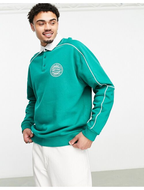 ASOS DESIGN oversized rugby sweatshirt with piping in green