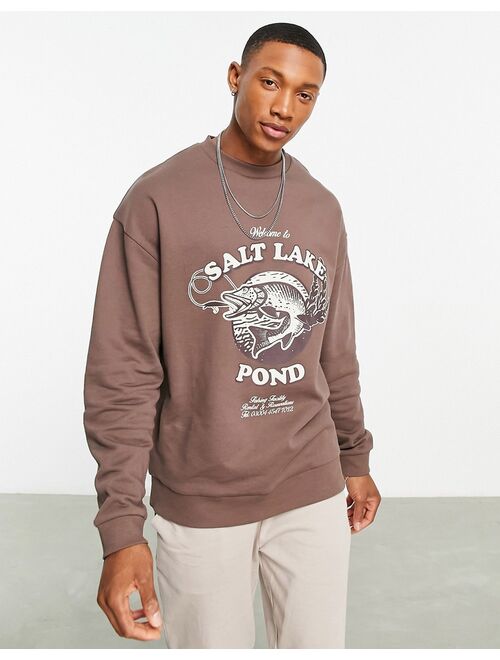 ASOS DESIGN oversized sweatshirt in brown with fishing print