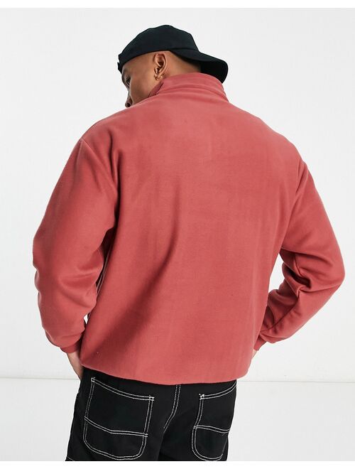 ASOS DESIGN ASOS Dark Future oversized quarter zip sweatshirt in polar fleece with gothic logo in red