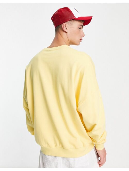 ASOS DESIGN super oversized sweatshirt in yellow