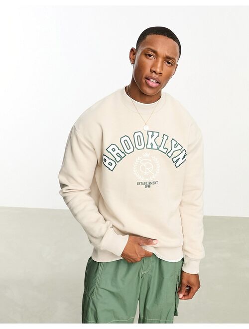 Bershka Brooklyn printed sweatshirt in ecru