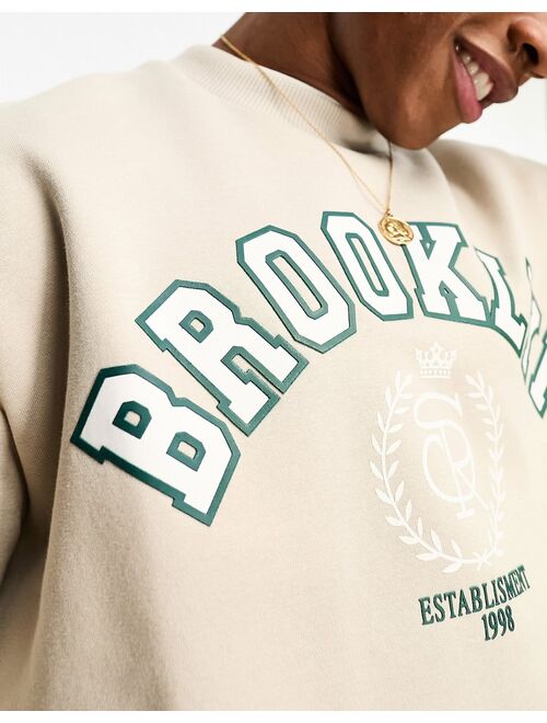 Bershka Brooklyn printed sweatshirt in ecru