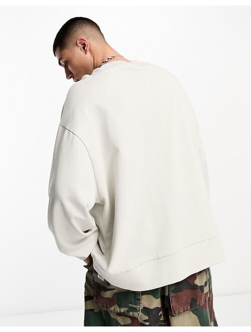 COLLUSION varsity embroidered logo sweatshirt in off white