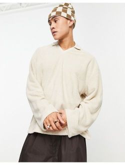 oversized sweatshirt with flute sleeve and collared neck in beige towelling