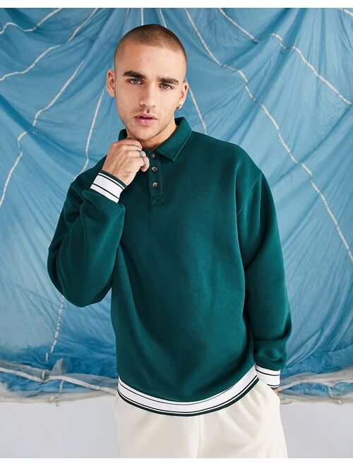 ASOS DESIGN overisized sweatshirt with button neck polo in green