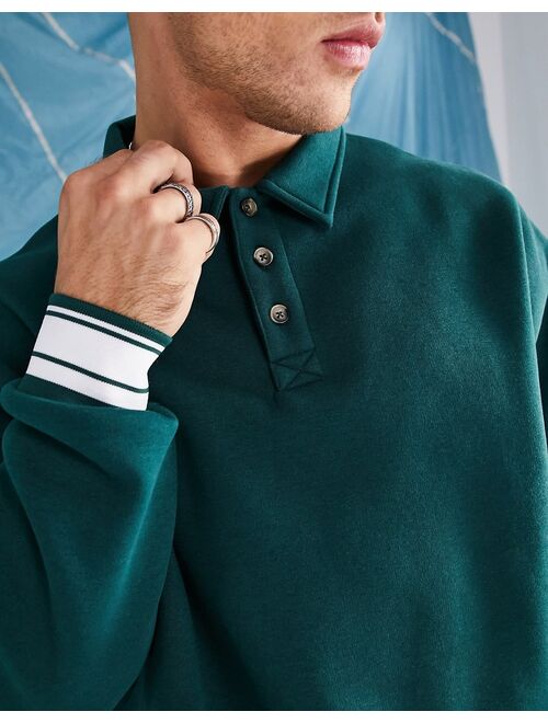 ASOS DESIGN overisized sweatshirt with button neck polo in green