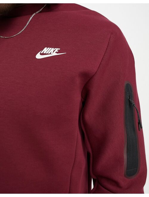 Nike Tech Fleece crew neck sweatshirt in dark red