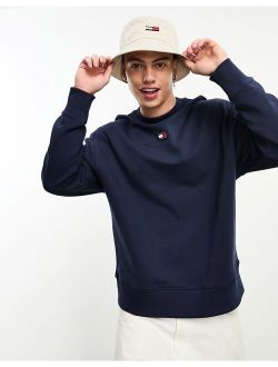 Tommy Jeans relaxed badge logo crew neck sweatshirt in blue