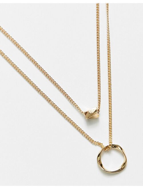 ASOS DESIGN multirow necklace with twisted bead and hoop design in gold tone