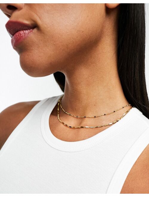 ASOS DESIGN 14k gold plated pack of 2 necklaces with dot dash and black enamel detail
