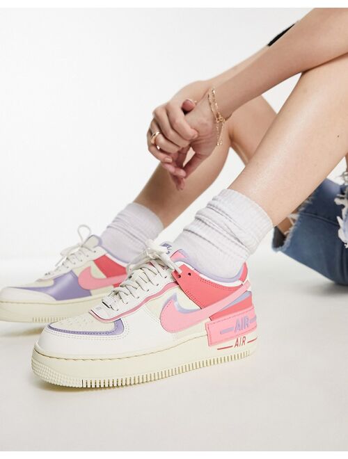 Nike Air Force 1 Shadow sneakers in white and pink