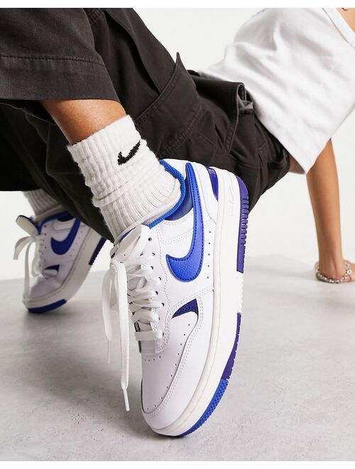 Nike Gamma Force sneakers in white & blue
