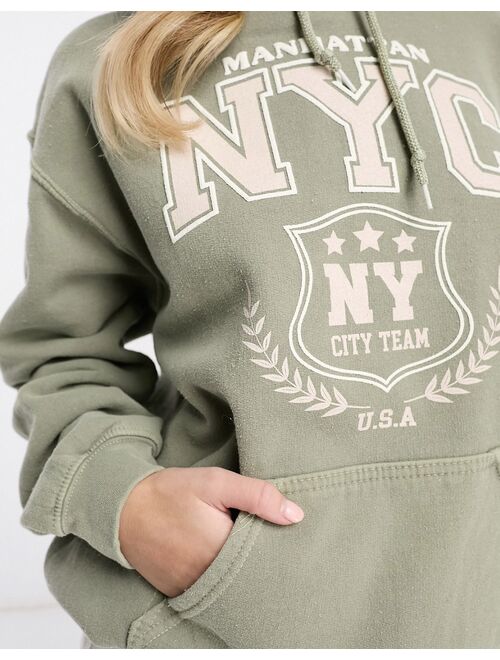 Miss Selfridge NYC graphic front print hoodie in vintage washed green