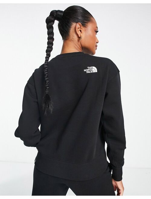 The North Face Essential oversized sweatshirt in black Exclusive at ASOS