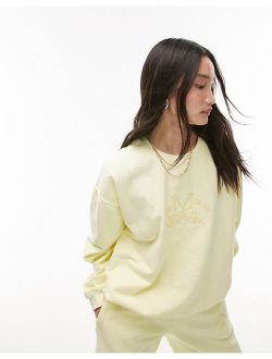 embroidered city graphic vintage wash sweatshirt in butter yellow - part of a set