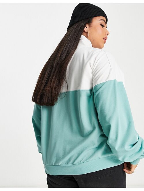 ASOS DESIGN Curve half zip sweatshirt in color block
