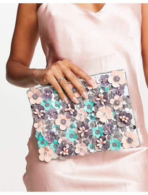 ASOS DESIGN clutch bag with 3D flowers in pink