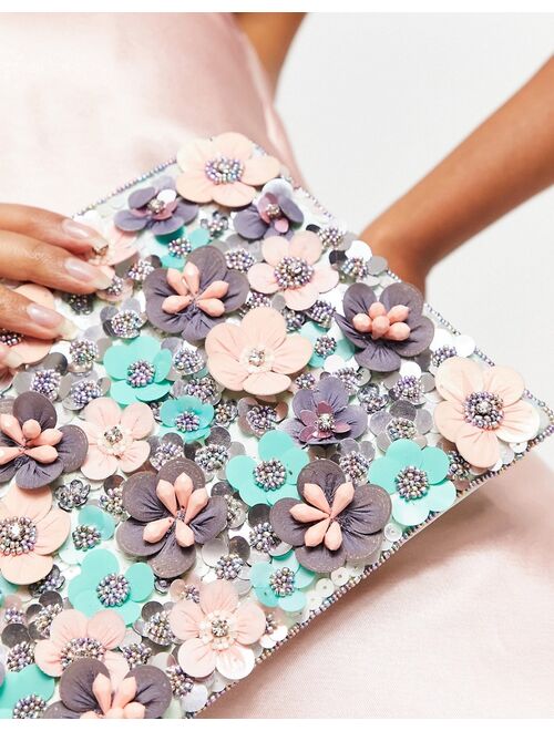ASOS DESIGN clutch bag with 3D flowers in pink