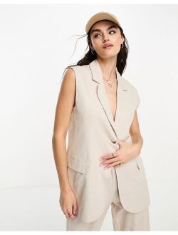 sleeveless suit blazer in Natural