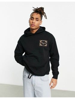 The Couture Club oversized hoodie in black with stamp logo print and drawstring hem