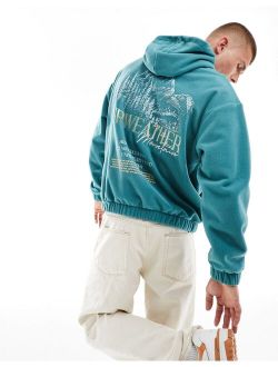 oversized hoodie with back print in teal fleece