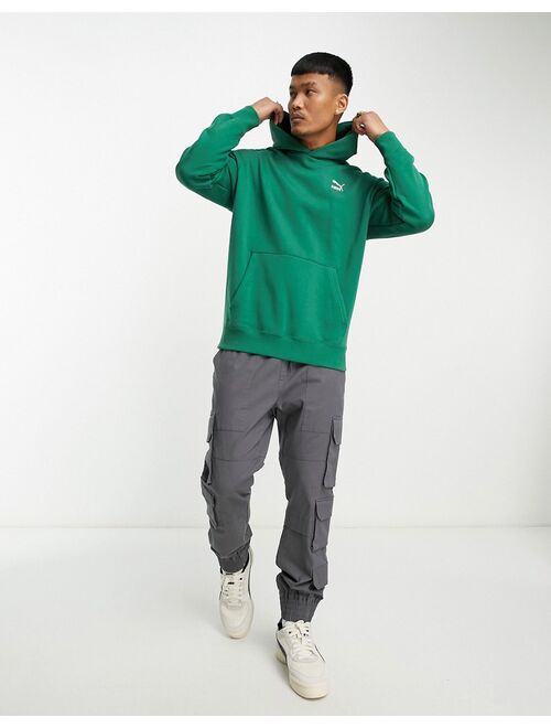 PUMA Classics relaxed logo hoodie in forest green