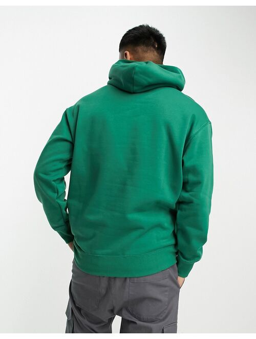 PUMA Classics relaxed logo hoodie in forest green