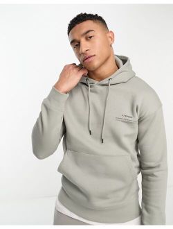 Essentials oversized hoodie with chest print in mint green