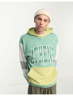 oversized color block hoodie with city print in green