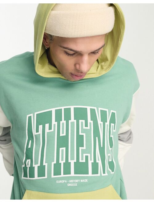 ASOS DESIGN oversized color block hoodie with city print in green