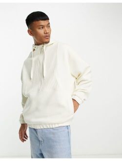 oversized hoodie in beige waffle color block with half zip