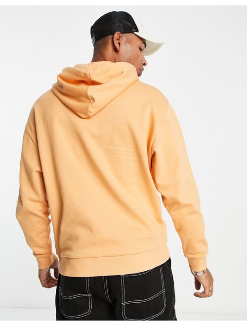 ASOS DESIGN oversized hoodie in pastel orange