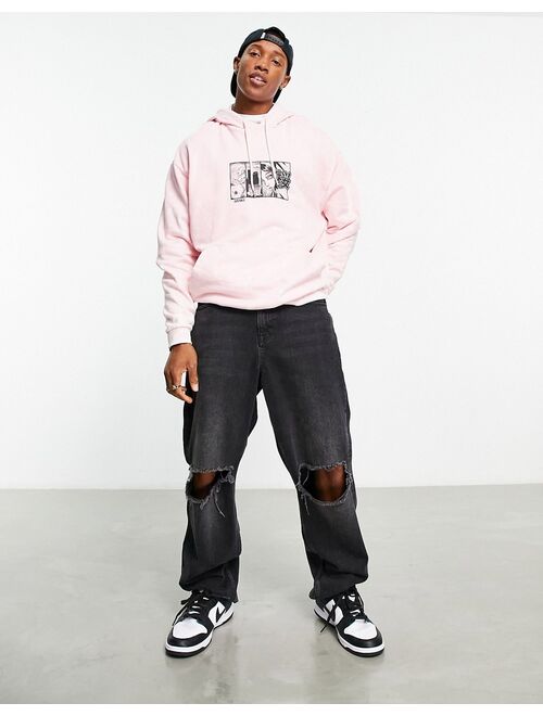 ASOS DESIGN oversized hoodie in pink with front cartoon print