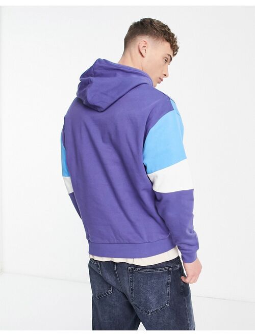 ASOS DESIGN oversized hoodie in blue & white color block with city print