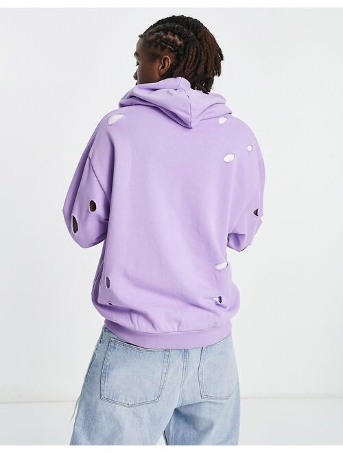 ASOS DESIGN oversized hoodie with distressing in purple