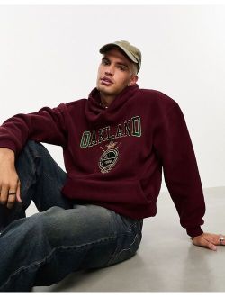 oversized polar fleece hoodie with city embroidery in burgundy